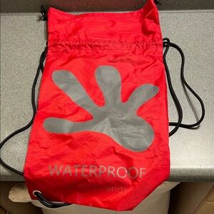 Red Drawstring Bag with Black Accents